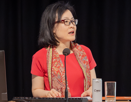 Professor Yuen Yuen Ang speaking at an academic lecture