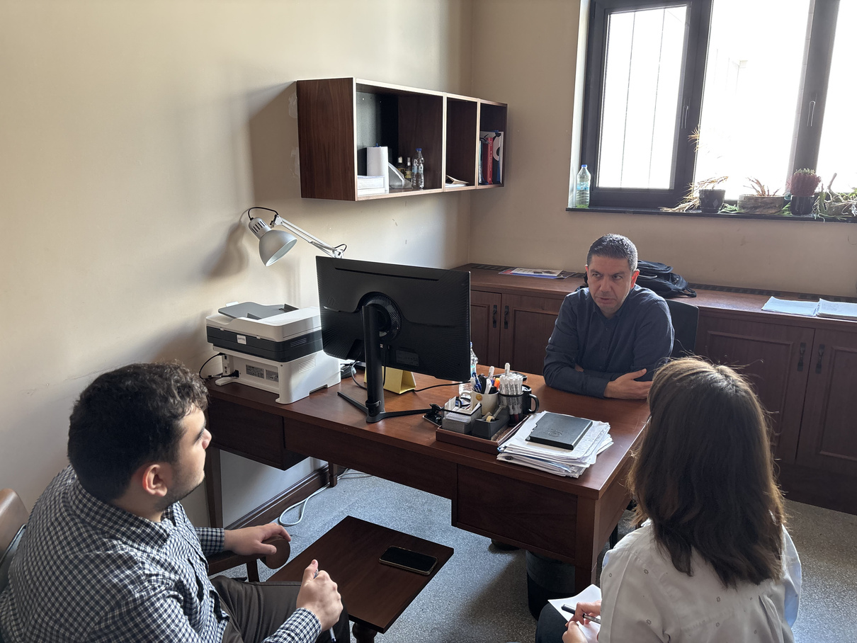 Prof. Dr. Seyit Mümin Cilasun, Arda Akgül, and Ezgi Eylem Erdoğan during the interview.