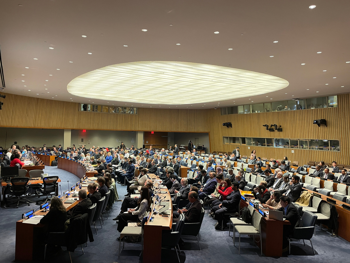 Conference room at the United Nations headquarters with large windows and formal seating